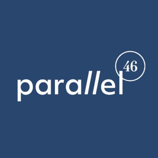 Parallel 46 logo in white on navy