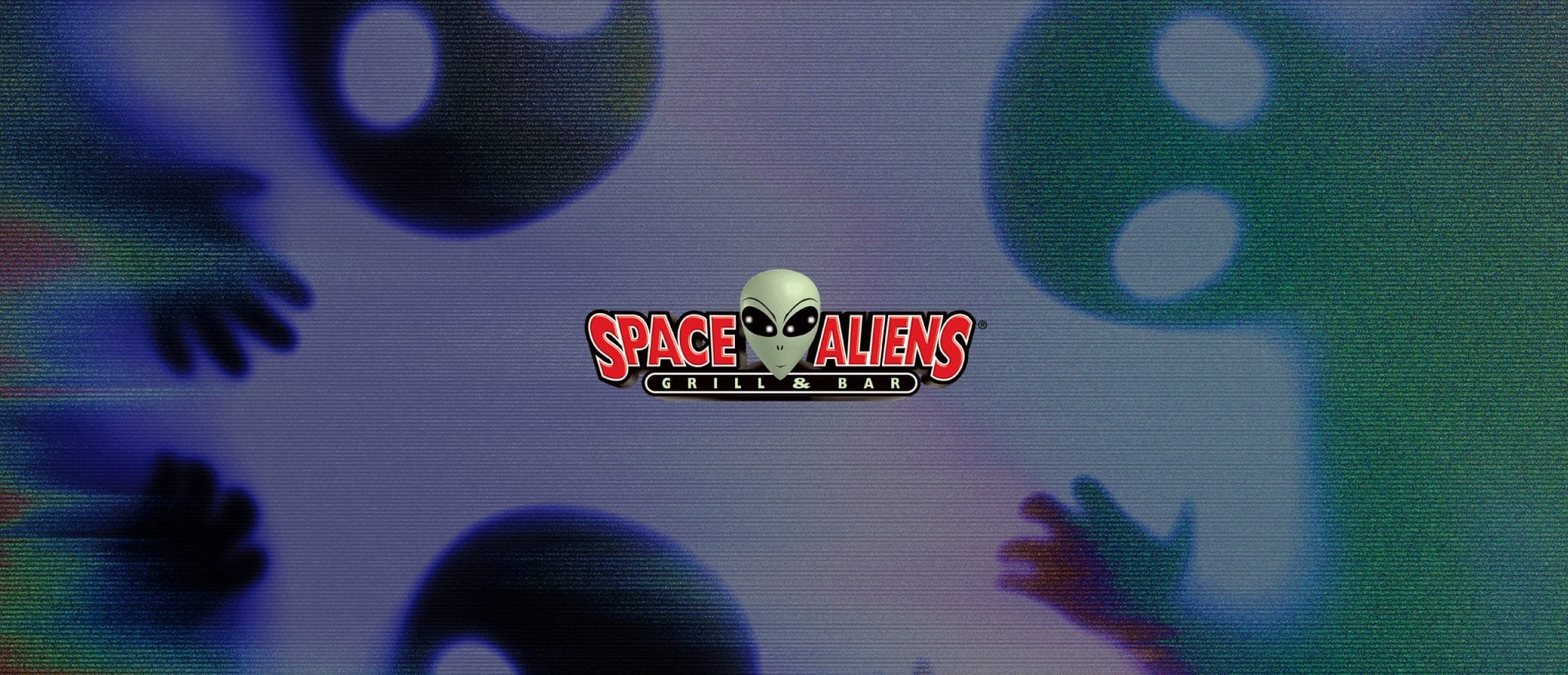 Space Aliens Grill & Bar banner over a retro TV image of alien faces and hands