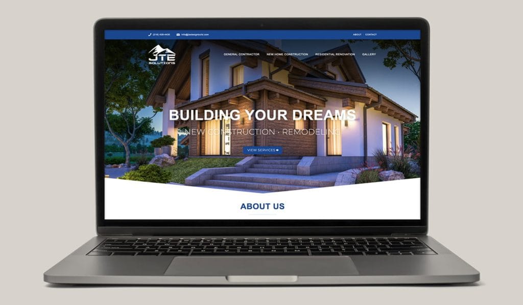 JTE Solutions contractor website on a laptop, headlined Building Your Dreams over a new home